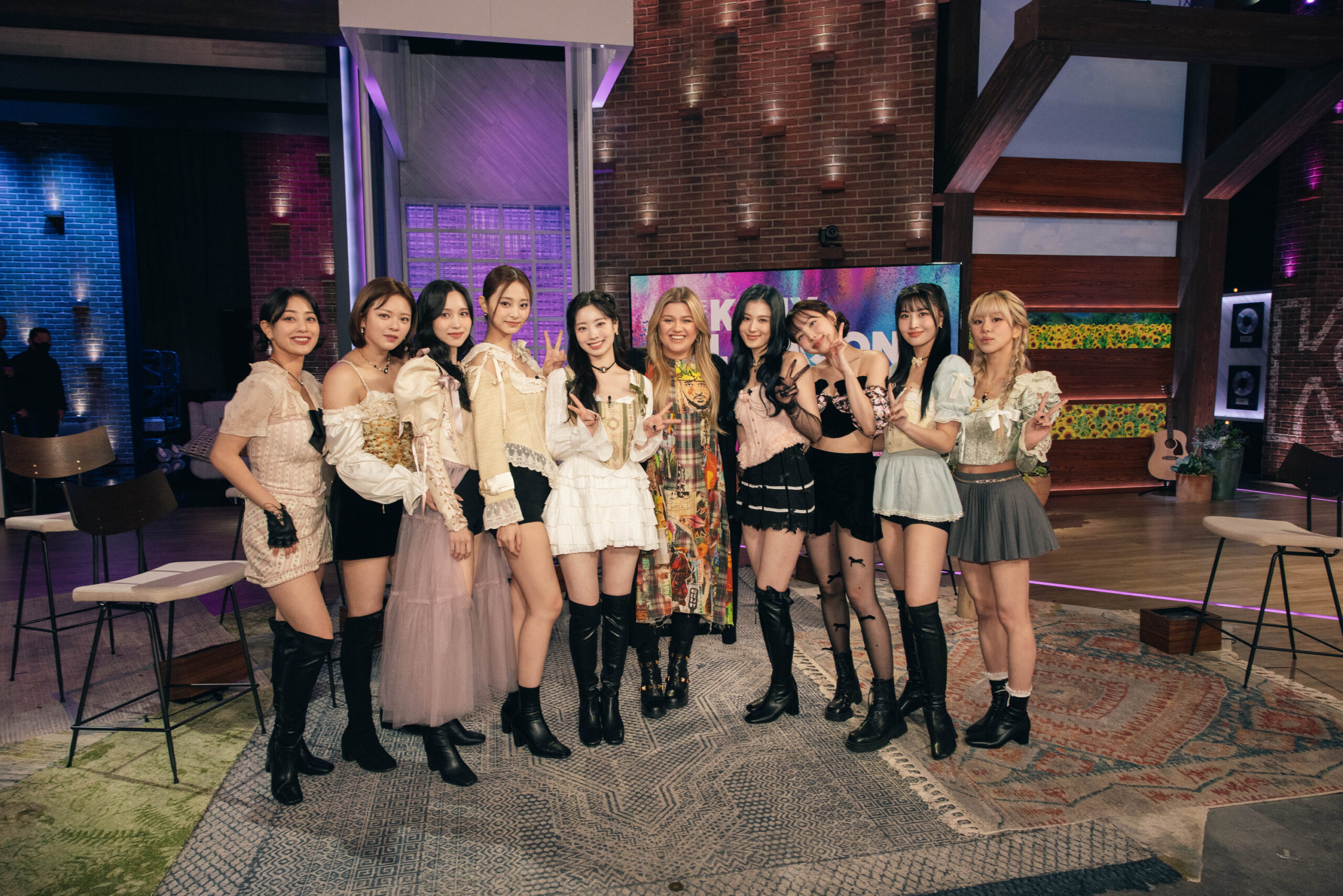 TWICE embraces romantic style on "The Kelly Clarkson Show," wearing corset dresses